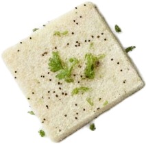 a piece of bread with a spel on top.jpg